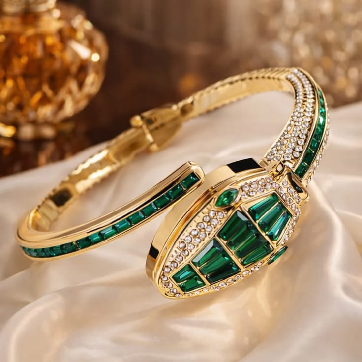 Close-up of Orek Emerald Serpent Watch showing serpent-inspired design and green detailing