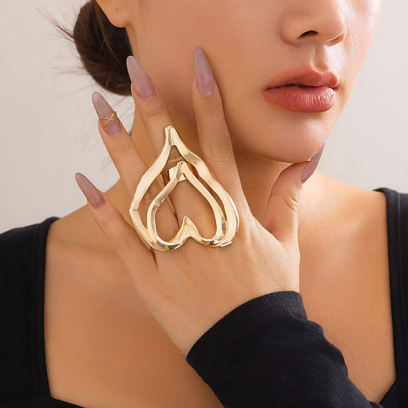 Close-up of Orek Eternal Flow Heart Ring showing flowing open-heart design