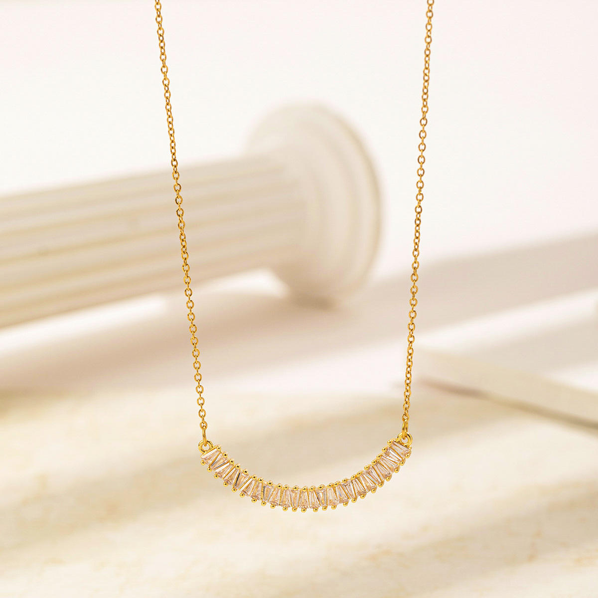 Woman wearing Orek Evara Pure Light Necklace with elegant silver pendant