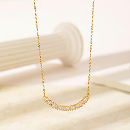 Woman wearing Orek Evara Pure Light Necklace with elegant silver pendant