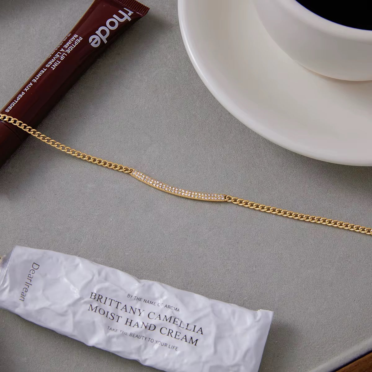 Close-up of Orek Ira Classic Glow Necklace showing pendant design