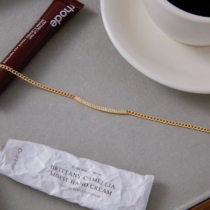 Close-up of Orek Ira Classic Glow Necklace showing pendant design