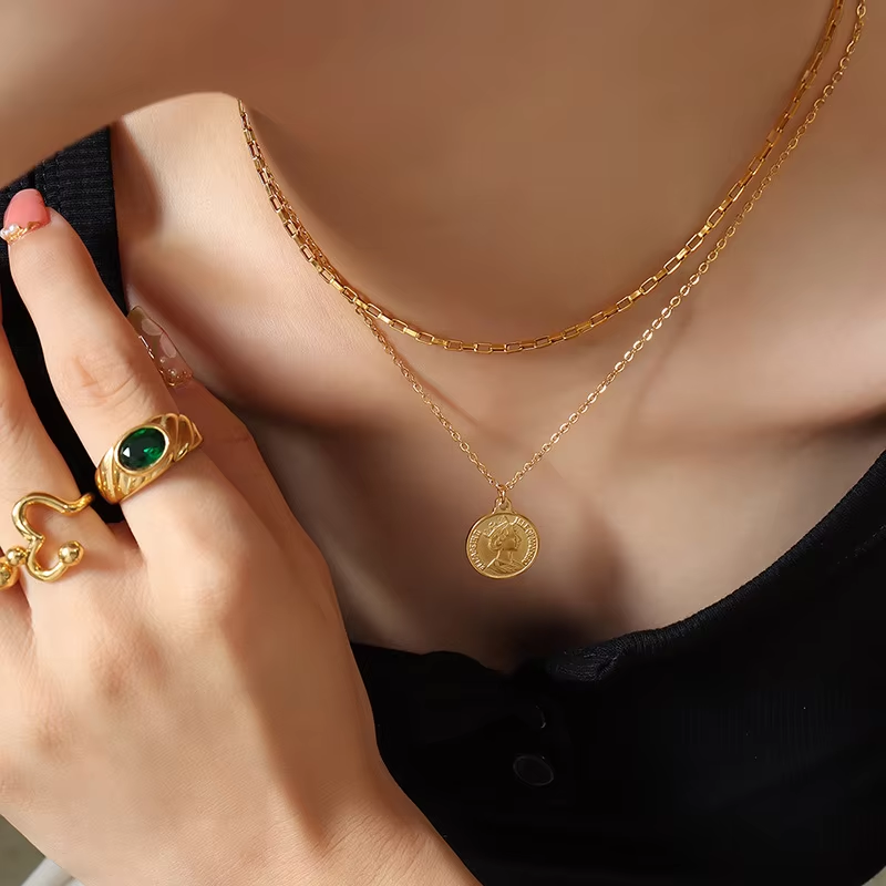 Woman wearing Orek Layered Gold Coin Pendant Necklace for everyday styling