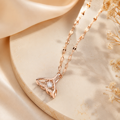Close-up of Orek Luna Tidal Muse Necklace showing heart pendant and premium rose gold finish