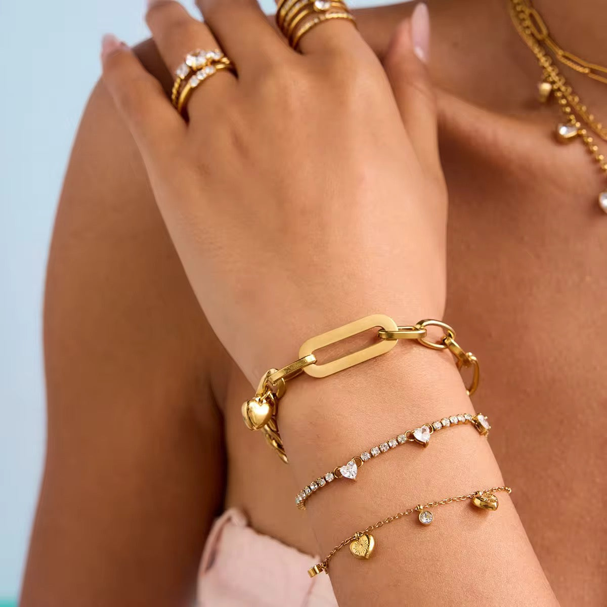 Model wearing Orek Mira Heart Whisper Bracelet