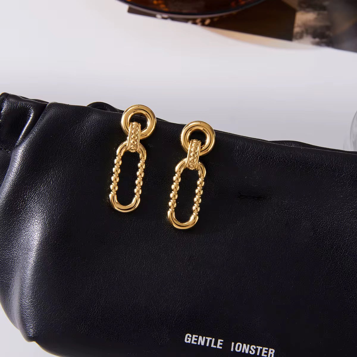 Orek Nyra Oval Muse Earring styled look, dangler earrings