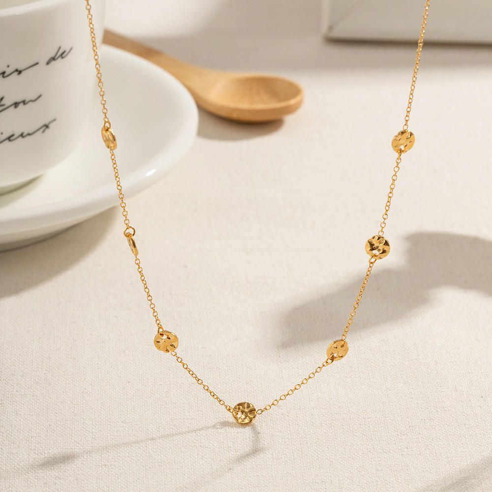 Close-up of the Orek Oria Hammered Dots Necklace showing premium hammered gold dot detailing and anti-tarnish finish.
