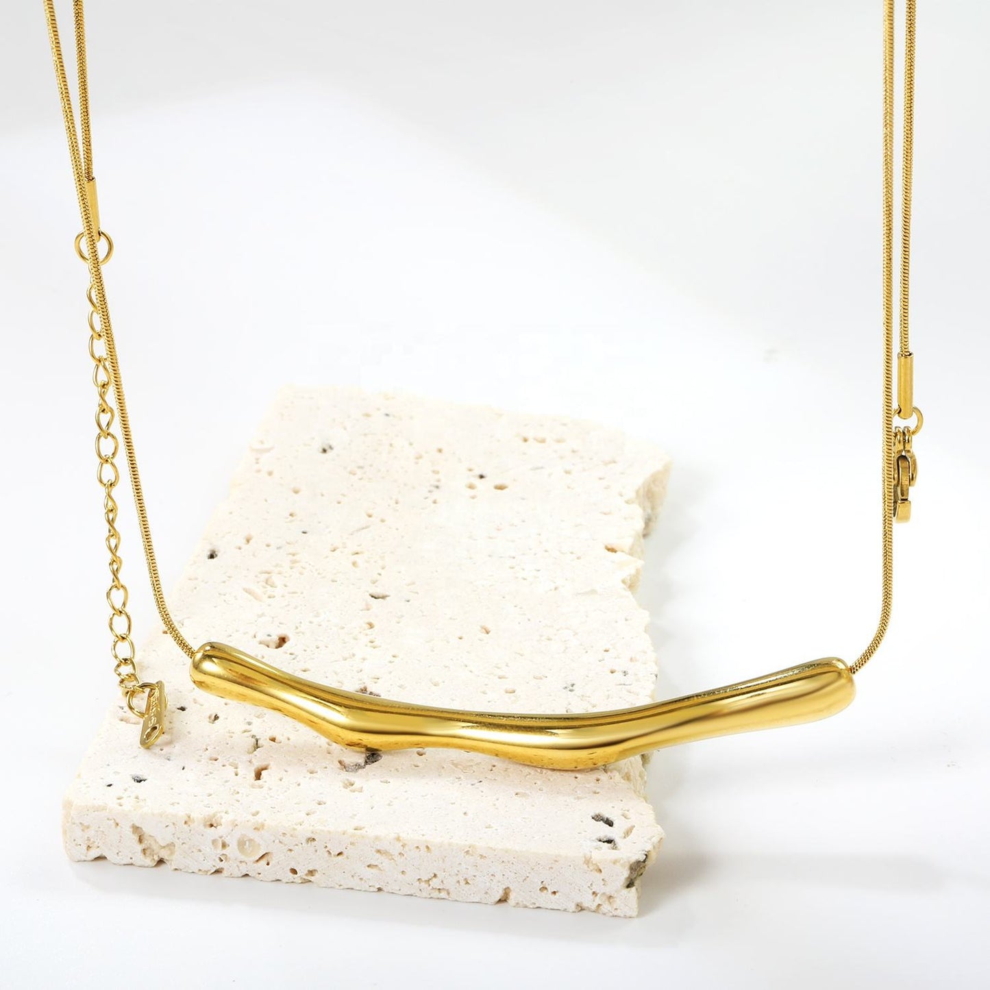 Close-up of Orek Sora Bamboo Flux Necklace showing bamboo-inspired bar pendant