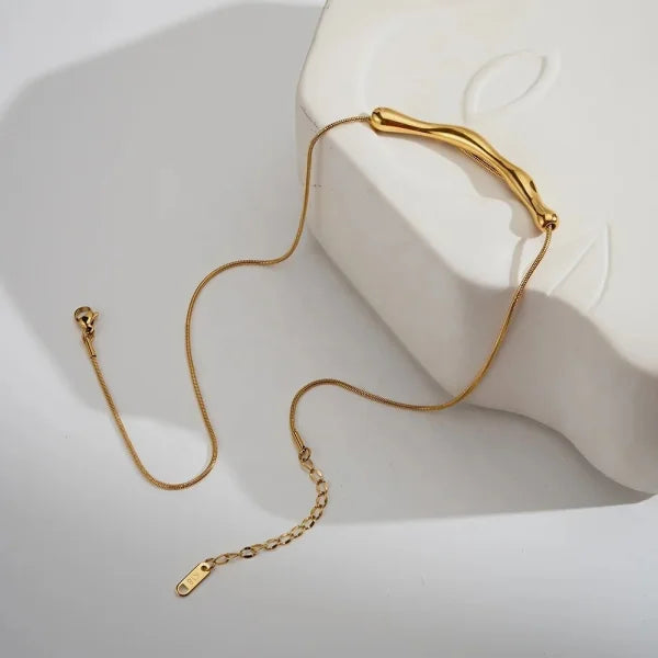 Woman wearing Orek Sora Bamboo Flux Necklace with minimalist everyday styling