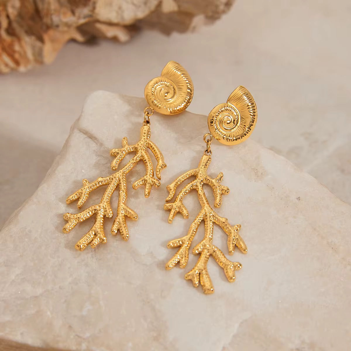 Close-up of Orek Sora Coral Muse Dangler showing premium 2.5 micron gold plating