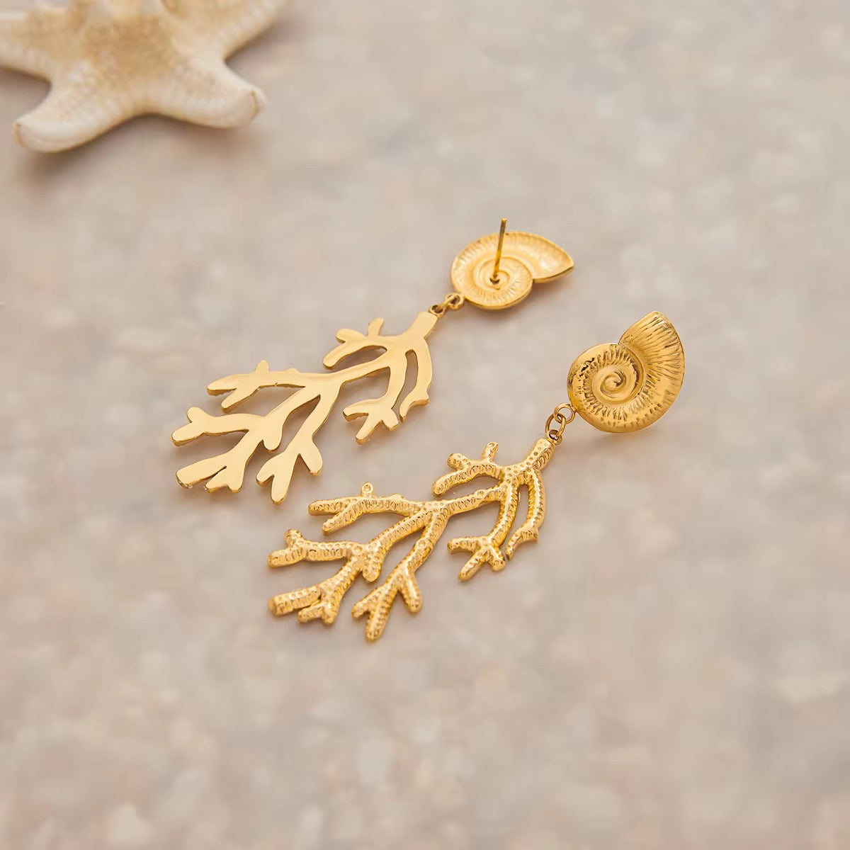 Detailed view of Orek Sora Coral Muse Dangler with anti-tarnish waterproof finish