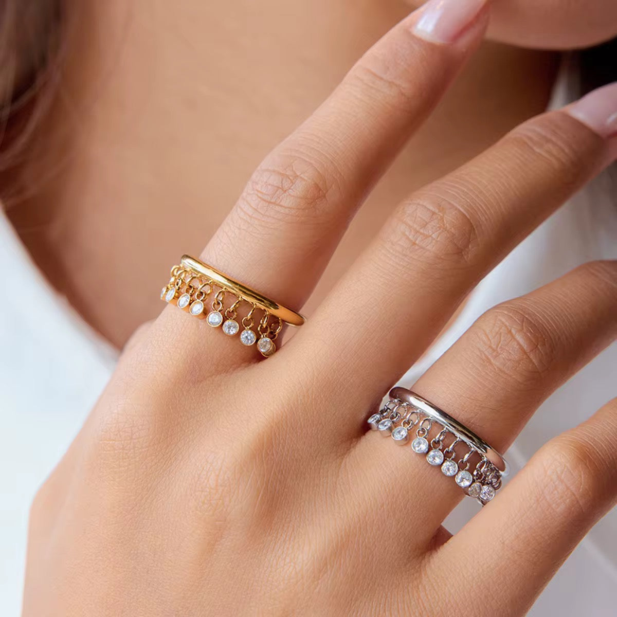 Orek Zircon Tassel Charm Ring styled on hand
