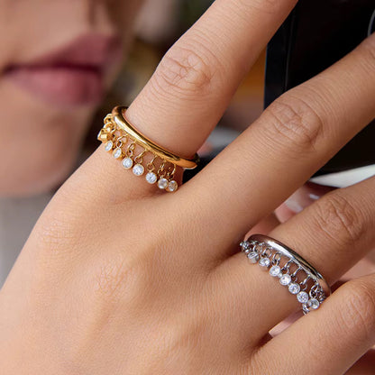 Model wearing Orek Zircon Tassel Charm Ring