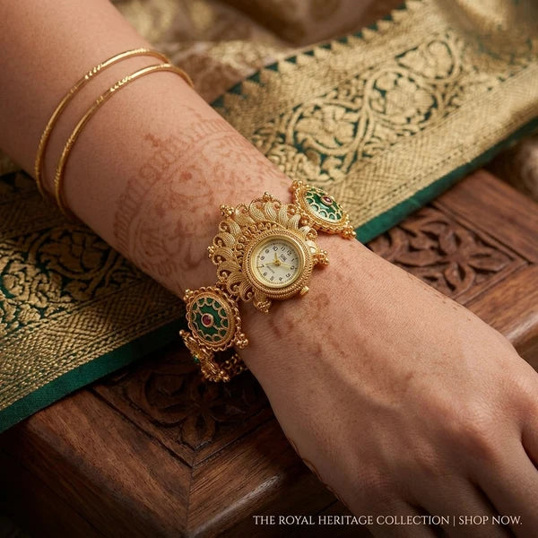Rajshree Traditional Gold Bracelet Watch with Green & Ruby Red Stone Details | Orek Jewellery